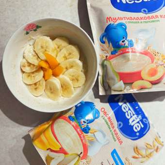 Каша молочная Nestle мультизлаковая груша-персик 200г с 6месяцев: отзыв пользователя Детский Мир