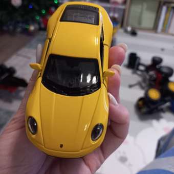 Машинка WELLY модель Porsche 911 Carrera 4S 1:38 желтая: отзыв пользователя Детский Мир